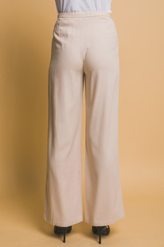 Pantalón lino botón beige