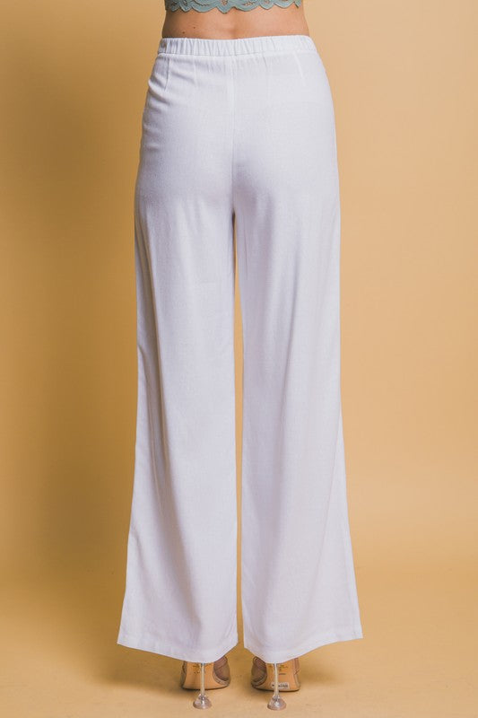 Pantalón lino botón blanco