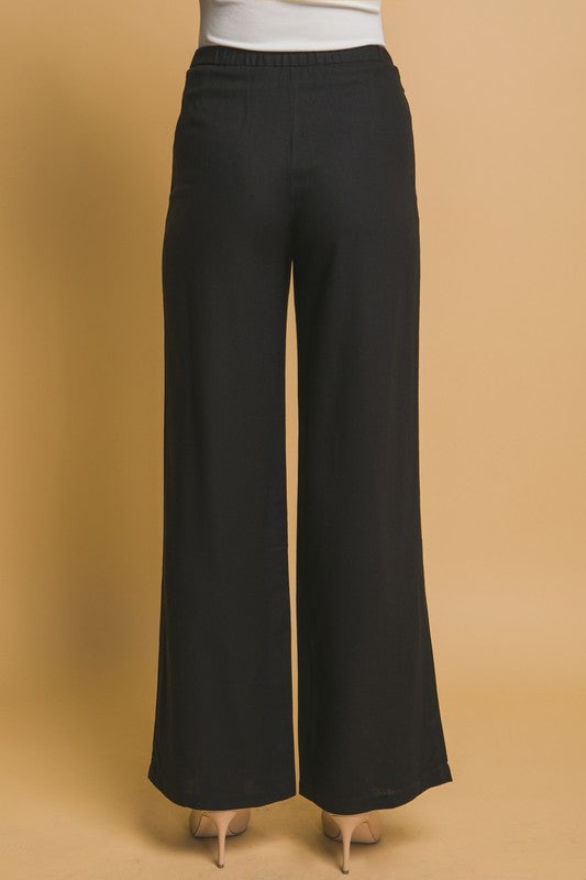 Pantalón lino botón negro